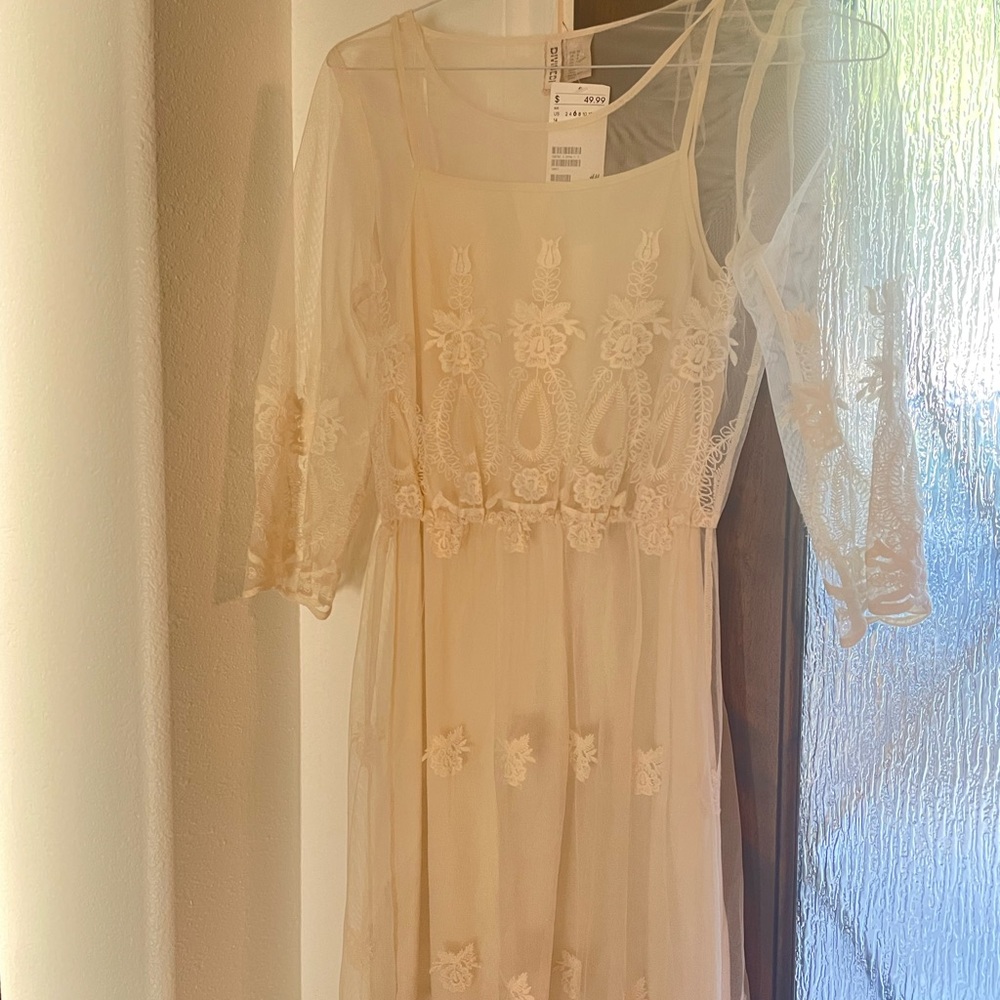 Divided midi dress size M. NWT